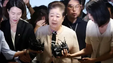 Disputed Religious Head Dismisses Bribery Claims Against Ex-South Korea President's Wife