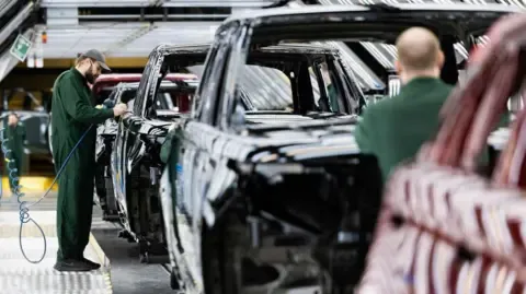 Jaguar Land Rover Vendor Network Staff Reportedly Told to Apply for Government Benefits, Labor Group Claims